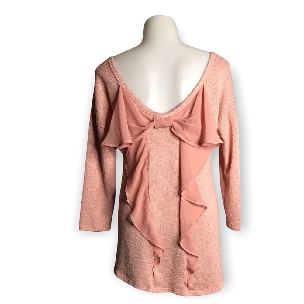 Charming Charlie | Pink Scoop Neck Bow Ruffle Back Sweater •
